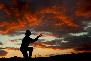 praying at sunset