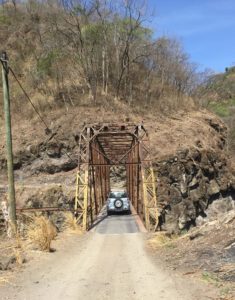 Rusty, rickety one lane bridge still standing after we pass 